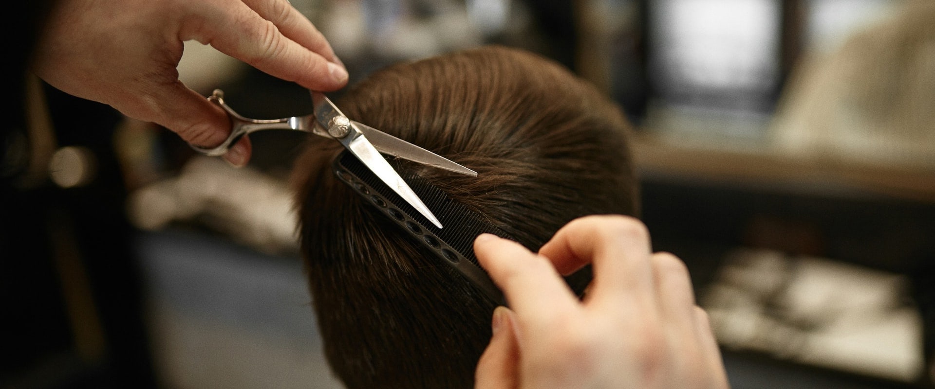 The Ultimate Hair Debate: Stylist vs. Barber